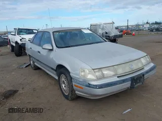 1991 Mercury Sable z VIN 1MECM50U6MG615570, wystawiony jako IAAI lot #41742946 z przebiegiem 19 426 mil mil oraz . Historia ofert i sprzedaży dostępna na DreamBid. Obrazek 1.