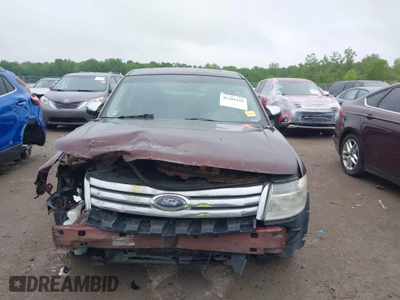 2009 Ford Taurus Limited z VIN 1FAHP25W69G100251, wystawiony jako IAAI lot #42289443 z przebiegiem 187 300 mil mil oraz . Historia ofert i sprzedaży dostępna na DreamBid. Obrazek 12.