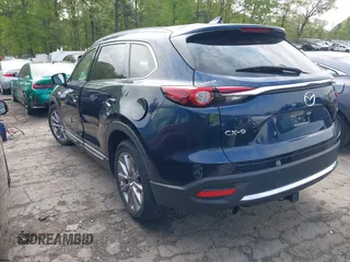 2021 Mazda CX-9 Carbon Edition with VIN JM3TCADY1M0516505, listed as a IAAI auction lot 42016644 with 50,900 mi miles and . Bid and sale history available at carsss.com. Image 3.