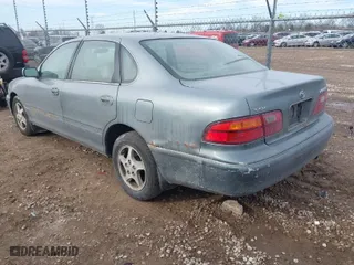 1999 Toyota Avalon XL with VIN 4T1BF18B9XU293219, listed as a IAAI auction lot 41467472 with NaN miles. Bid and sale history available at carsss.com. Image 3.