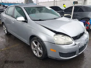 2009 Volkswagen Jetta S z VIN 3VWJZ71K29M148712, wystawiony jako IAAI lot #41724523 z przebiegiem 112 043 mil mil oraz . Historia ofert i sprzedaży dostępna na DreamBid. Obrazek 1.