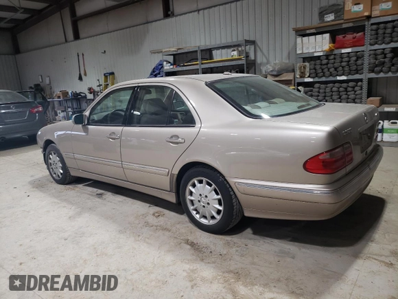 2001 Mercedes-Benz E-Class AWD with VIN WDBJF82J71X043474, listed as a Copart auction lot 45512025 with 59,571 mi miles and Salvage Title. Bid and sale history available at carsss.com. Image 2.