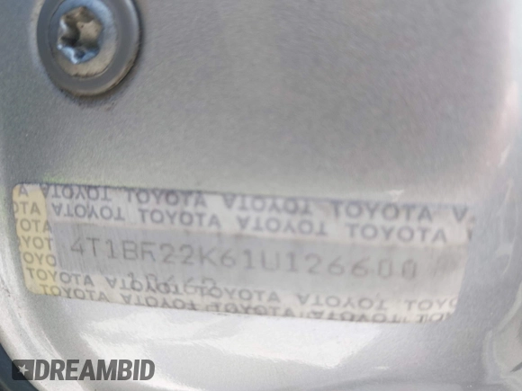 2001 Toyota Camry LE z VIN 4T1BF22K61U126600, wystawiony jako IAAI lot #42175093 z przebiegiem 294 276 mil mil oraz . Historia ofert i sprzedaży dostępna na DreamBid. Obrazek 9.