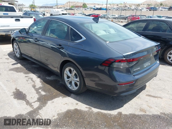 2023 Honda Accord Sedan LX with VIN 1HGCY1F28PA004601, listed as a IAAI auction lot 42031327 with 48,996 mi miles. Bid and sale history available at carsss.com. Image 3.