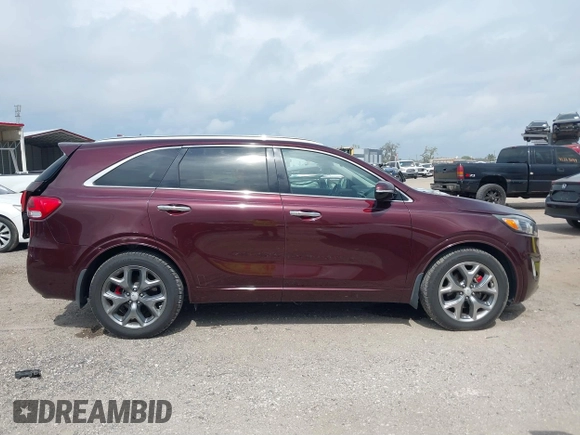 2017 Kia Sorento SXL z VIN 5XYPK4A53HG254253, wystawiony jako IAAI lot #41729210 z przebiegiem 52 119 mil mil oraz . Historia ofert i sprzedaży dostępna na DreamBid. Obrazek 13.
