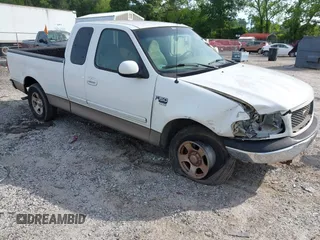 2001 Ford F-150 XL z VIN 1FTRX17WX1NA20036, wystawiony jako IAAI lot #42231600 z przebiegiem 181 549 mil mil oraz . Historia ofert i sprzedaży dostępna na DreamBid. Obrazek 1.