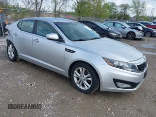2012 Kia Optima LX z VIN 5XXGM4A78CG063842, wystawiony jako IAAI lot #42128305 z przebiegiem 98 357 mil mil oraz . Historia ofert i sprzedaży dostępna na DreamBid. Obrazek 1.