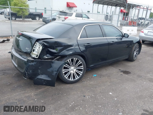 2013 Chrysler 300 with VIN 2C3CCABT2DH735764, listed as a IAAI auction lot 41977616 with 164,517 mi miles. Bid and sale history available at carsss.com. Image 4.