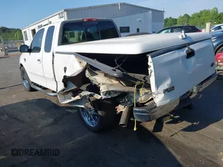 2000 Ford F-150 XL with VIN 1FTRX17L7YNB73649, listed as a IAAI auction lot 42159021 with Not provided miles and . Bid and sale history available at DreamBid. Image 3.