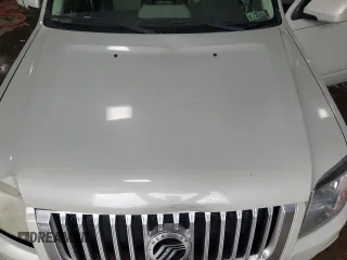 2009 Mercury Mariner Premier with VIN 4M2CU97G59KJ20381, listed as a Copart auction lot 56682175 with 155,896 mi miles and Salvage title. Bid and sale history available at DreamBid. Image 12.
