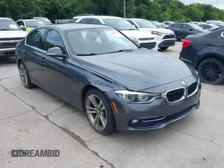2018 BMW 3 Series 330i xDrive with VIN WBA8D9C55JEM32703, listed as a IAAI auction lot 42478412 with 79,000 mi miles and . Bid and sale history available at DreamBid. Image 1.
