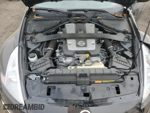 2014 Nissan 370Z Touring with VIN JN1AZ4EH2EM633814, listed as a Copart auction lot 84120274 with 22,979 mi miles and Salvage Title. Bid and sale history available at carsss.com. Image 12.