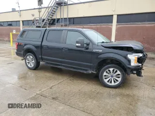 2018 Ford F-150 XL with VIN 1FTEW1EG0JFD10941, listed as a Copart auction lot 57855095 with 119,345 mi miles and Salvage title. Bid and sale history available at DreamBid. Image 4.