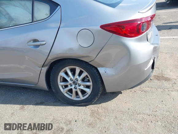 2014 Mazda 3 i Grand Touring with VIN JM1BM1W72E1196080, listed as a IAAI auction lot 42002800 with 88,772 mi miles. Bid and sale history available at carsss.com. Image 6.
