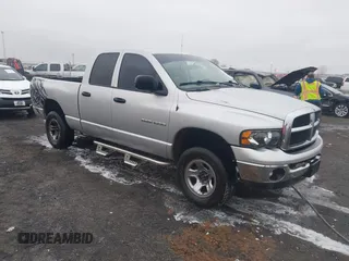 2003 Dodge 1500 SLT z VIN 1D7HU18N93J552307, wystawiony jako IAAI lot #41490826 z przebiegiem 247 015 mil mil oraz . Historia ofert i sprzedaży dostępna na DreamBid. Obrazek 1.