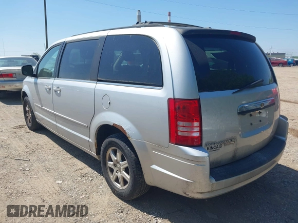 2008 Chrysler Town & Country Touring with VIN 2A8HR54P18R777245, listed as a IAAI auction lot 42241365 with 149,478 mi miles and . Bid and sale history available at DreamBid. Image 3.