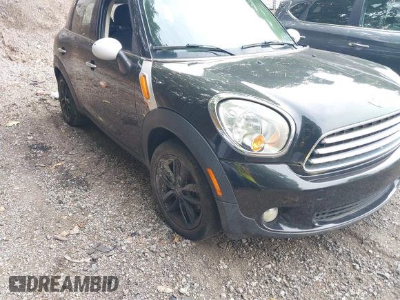 2012 MINI Countryman with VIN WMWZB3C5XCWM30191, listed as a IAAI auction lot 42435291 with 103,254 mi miles and . Bid and sale history available at DreamBid. Image 6.
