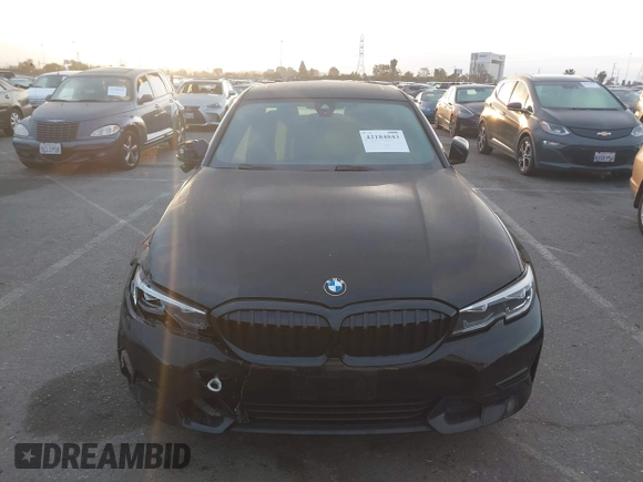 2021 BMW 3 Series 330i with VIN 3MW5R1J02M8B95303, listed as a IAAI auction lot 42184843 with 55,928 mi miles and . Bid and sale history available at carsss.com. Image 13.