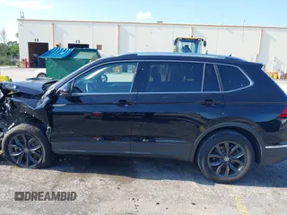 2024 Volkswagen Tiguan SE with VIN 3VVNB7AXXRM199400, listed as a IAAI auction lot 42216941 with 11,581 mi miles and . Bid and sale history available at DreamBid. Image 14.