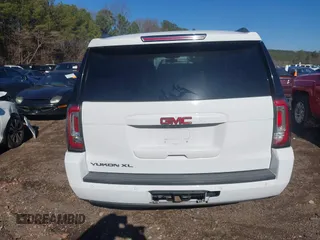 2016 GMC Yukon XL SLE with VIN 1GKS2FKC6GR458066, listed as a IAAI auction lot 41252794 with 168,606 mi miles. Bid and sale history available at carsss.com. Image 16.