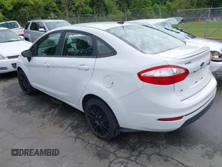 2019 Ford Fiesta SE z VIN 3FADP4BJ2KM143337, wystawiony jako IAAI lot #42179937 z przebiegiem 124 078 mil mil oraz . Historia ofert i sprzedaży dostępna na DreamBid. Obrazek 3.