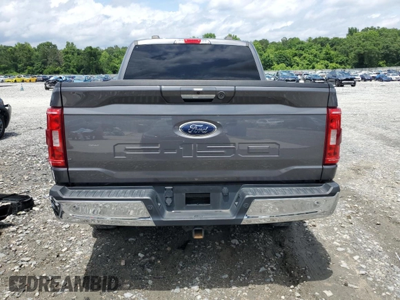 2021 Ford F-150 XL with VIN 1FTFW1EDXMFC91152, listed as a Copart auction lot 58350455 with 59,992 mi miles and Salvage title. Bid and sale history available at DreamBid. Image 6.