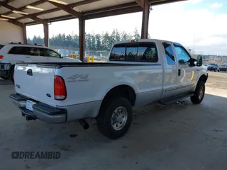 2000 Ford F-250 XL with VIN 1FTNX21F4YEC30722, listed as a IAAI auction lot 41409384 with 310,516 mi miles and . Bid and sale history available at DreamBid. Image 4.