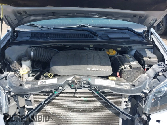 2017 Dodge Grand Caravan SE with VIN 2C4RDGBG8HR819905, listed as a IAAI auction lot 42086955 with 125,470 mi miles and . Bid and sale history available at DreamBid. Image 10.