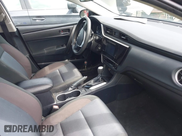 2018 Toyota Corolla L with VIN 2T1BURHE7JC018388, listed as a IAAI auction lot 42102862 with 111,882 mi miles and . Bid and sale history available at DreamBid. Image 5.