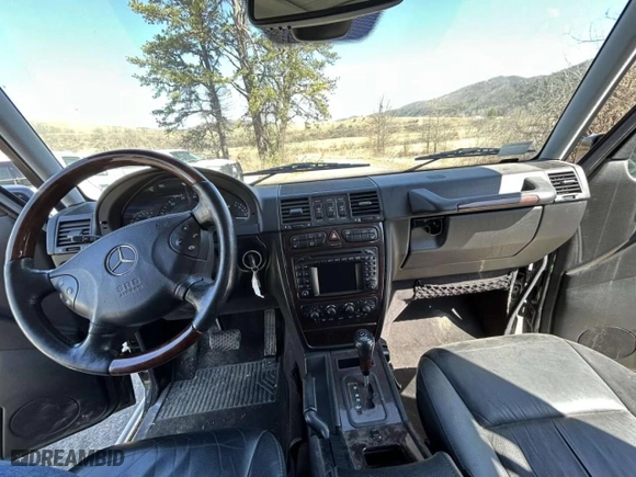 2003 Mercedes-Benz G-Class with VIN WDCYR49E33X141312, listed as a Copart auction lot 50188485 with 146,986 mi miles and Salvage Title. Bid and sale history available at carsss.com. Image 9.