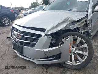 2018 Cadillac ATS Luxury RWD z VIN 1G6AB5RX6J0110860, wystawiony jako IAAI lot #41556662 z przebiegiem 63 886 mil mil oraz . Historia ofert i sprzedaży dostępna na DreamBid. Obrazek 18.