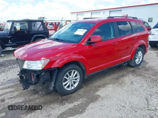 2014 Dodge Journey SXT z VIN 3C4PDCBG2ET161135, wystawiony jako IAAI lot #42233836 z przebiegiem 119 230 mil mil oraz . Historia ofert i sprzedaży dostępna na DreamBid. Obrazek 18.