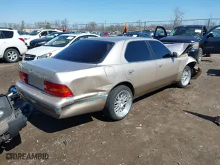 1997 Lexus LS 400 Luxury Sdn with VIN JT8BH28F8V0097217, listed as a IAAI auction lot 41829113 with 115,262 mi miles. Bid and sale history available at carsss.com. Image 4.
