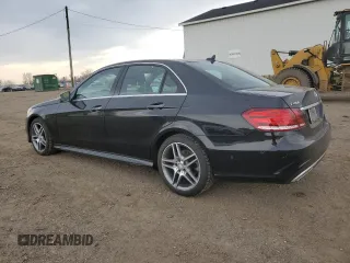 2015 Mercedes-Benz E-Class E 400 with VIN WDDHF6HBXFB082946, listed as a Copart auction lot 54547945 with 213,423 mi miles and Clean Title. Bid and sale history available at carsss.com. Image 2.
