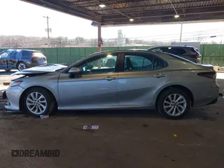 2023 Toyota Camry LE z VIN 4T1C11AK5PU127664, wystawiony jako IAAI lot #41653925 z przebiegiem 24 378 mil mil oraz . Historia ofert i sprzedaży dostępna na DreamBid. Obrazek 14.