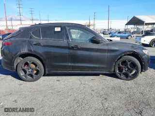 2022 Alfa Romeo Stelvio Ti with VIN ZASPAKBN5N7D24275, listed as a IAAI auction lot 41360975 with 24,668 mi miles. Bid and sale history available at carsss.com. Image 14.