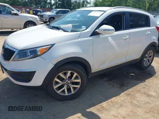 2015 Kia Sportage LX with VIN KNDPB3AC8F7720956, listed as a IAAI auction lot 41987551 with 178,281 mi miles and . Bid and sale history available at DreamBid. Image 2.