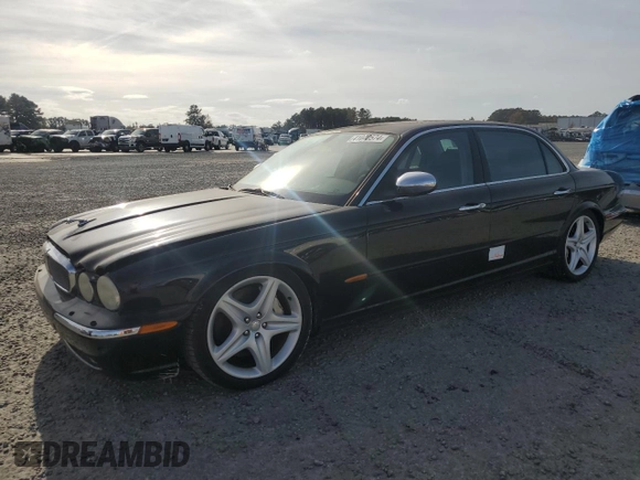2005 Jaguar XJ Vanden Plas with VIN SAJWA82B05TG47030, listed as a Copart auction lot 41040574 with 114,520 mi miles and Salvage Title. Bid and sale history available at carsss.com. Image 1.