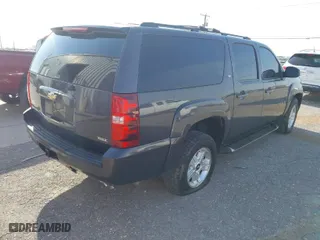 2011 Chevrolet Suburban LT with VIN 1GNSKJE34BR242629, listed as a IAAI auction lot 42043276 with 197,722 mi miles. Bid and sale history available at carsss.com. Image 4.