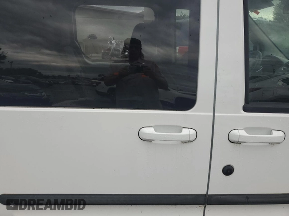 2012 Ford Transit Connect XLT with VIN NM0KS9BN9CT124462, listed as a Copart auction lot 65176614 with Not provided miles and Salvage title. Bid and sale history available at DreamBid. Image 11.