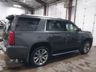 2016 Chevrolet Tahoe LTZ with VIN 1GNSKCKC7GR455033, listed as a IAAI auction lot 40811560 with 165,845 mi miles. Bid and sale history available at carsss.com. Image 13.