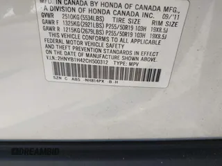 2012 Acura ZDX Tech Pkg with VIN 2HNYB1H42CH500312, listed as a IAAI auction lot 41841597 with 166,879 mi miles. Bid and sale history available at carsss.com. Image 9.