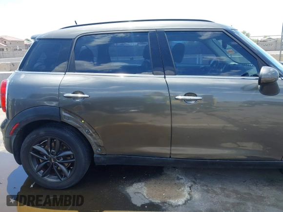 2014 MINI Countryman S with VIN WMWZC3C59EWP29137, listed as a IAAI auction lot 42661922 with 128,064 mi miles and . Bid and sale history available at DreamBid. Image 13.