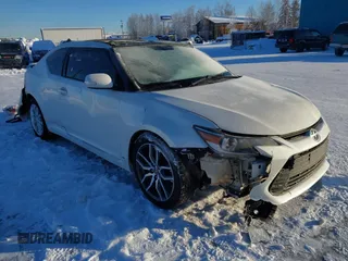 2015 Scion tC z VIN JTKJF5C76F3089615, wystawiony jako IAAI lot #41450719 z przebiegiem 133 559 mil mil oraz . Historia ofert i sprzedaży dostępna na DreamBid. Obrazek 1.