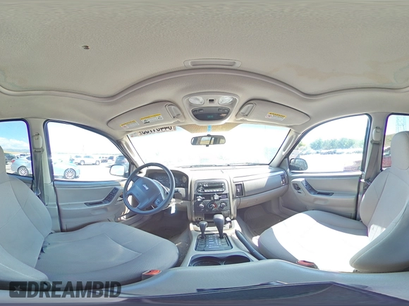 2003 Jeep Grand Cherokee Laredo with VIN 1J4GW48S23C524693, listed as a Copart auction lot 64461755 with 243,936 mi miles and Salvage title. Bid and sale history available at DreamBid. Image 16.