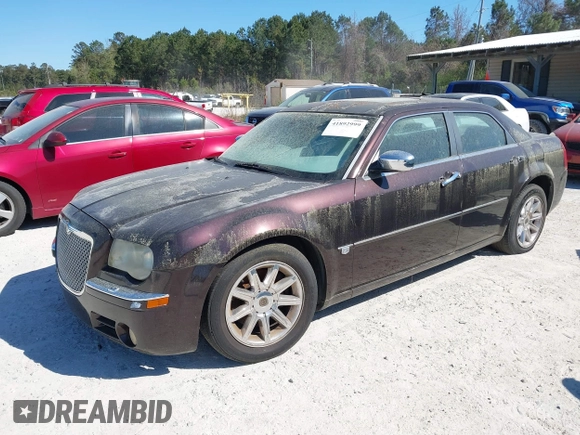 2005 Chrysler 300 with VIN 2C3AA63H75H577363, listed as a IAAI auction lot 41892999 with 229,634 mi miles. Bid and sale history available at carsss.com. Image 2.