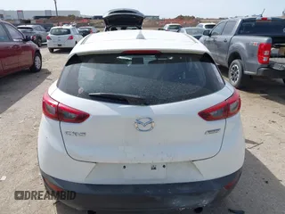 2018 Mazda CX-3 Touring z VIN JM1DKDC75J0326180, wystawiony jako IAAI lot #41787541 z przebiegiem 96 584 mil mil oraz . Historia ofert i sprzedaży dostępna na DreamBid. Obrazek 16.