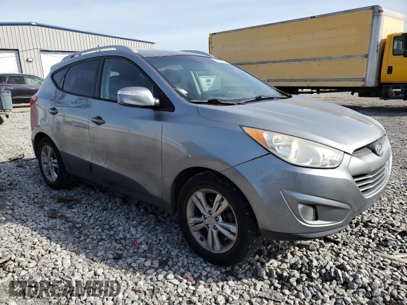 2013 Hyundai Tucson GLS with VIN KM8JU3AC4DU742026, listed as a Copart auction lot 54589255 with 251,661 mi miles and Clean Title. Bid and sale history available at carsss.com. Image 4.