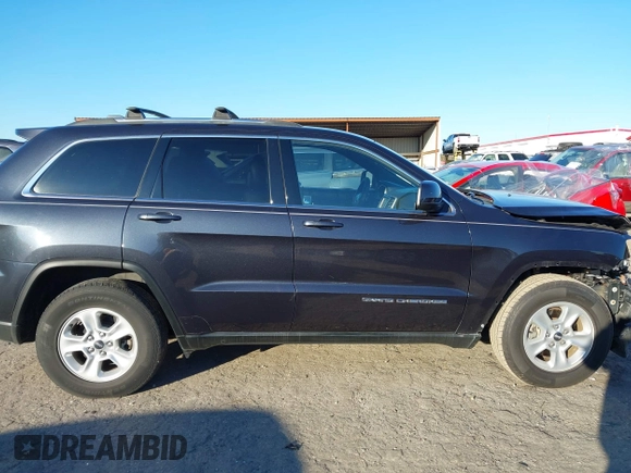 2014 Jeep Grand Cherokee Laredo with VIN 1C4RJEAG3EC218128, listed as a IAAI auction lot 40951611 with 119,596 mi miles and . Bid and sale history available at DreamBid. Image 13.