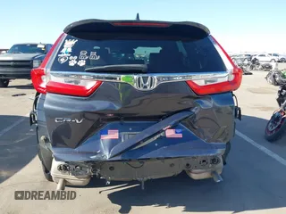 2018 Honda CR-V EX-L z VIN 7FARW1H87JE055784, wystawiony jako IAAI lot #42028869 z przebiegiem 135 222 mil mil oraz . Historia ofert i sprzedaży dostępna na DreamBid. Obrazek 6.
